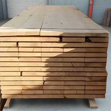 Load image into Gallery viewer, Stack of high-quality scaffold boards available from Brunswick Turf, ideal for construction, landscaping, and garden projects. Durable and neatly stacked for easy handling.
